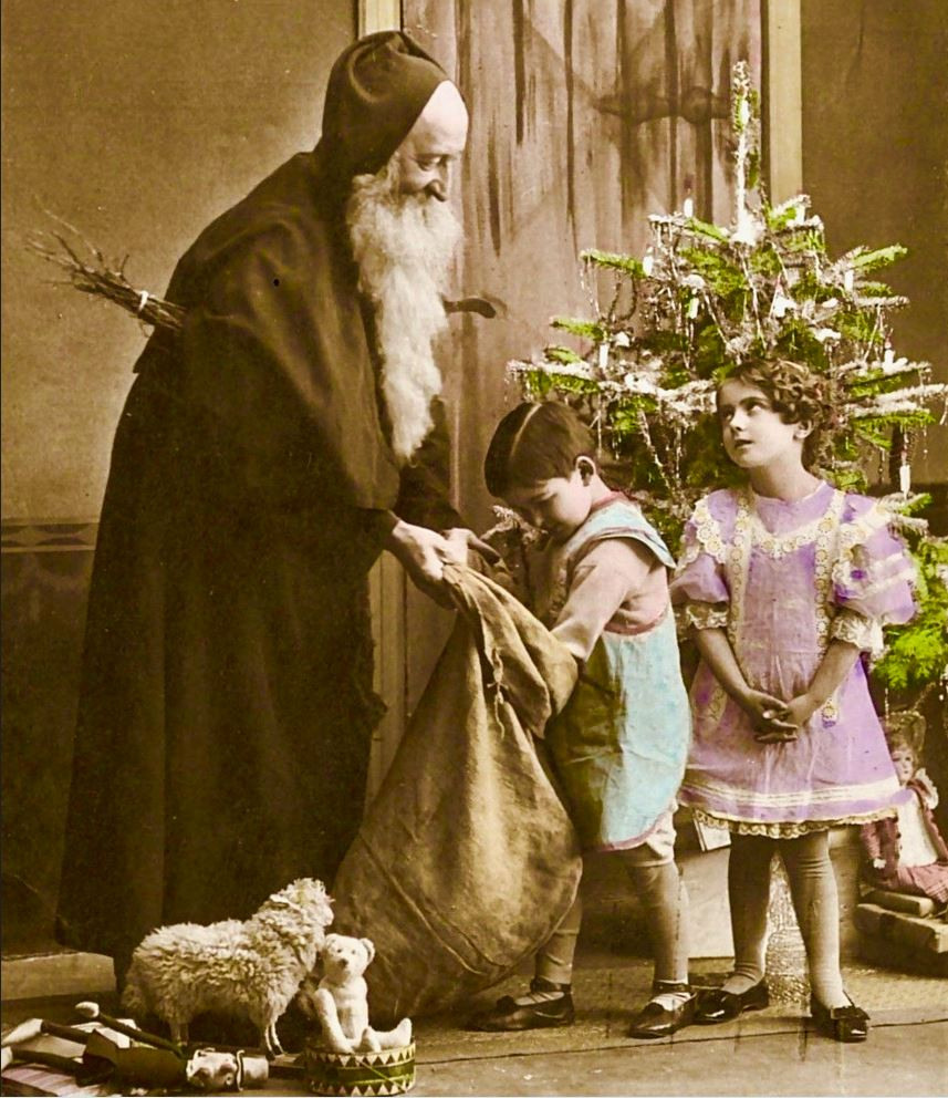 Le père Noël 1900 distribue ses jouets aux enfants