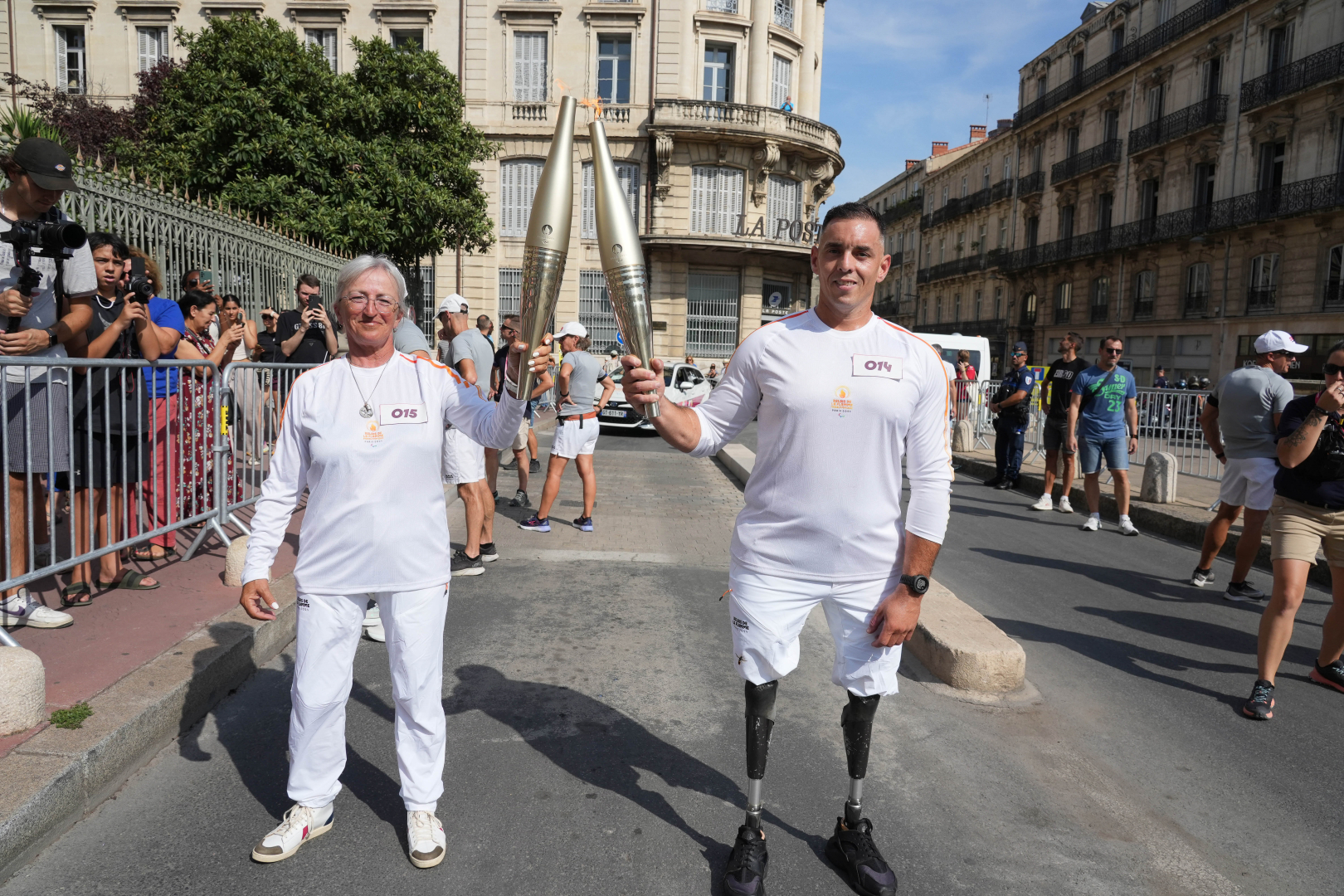 relais torche paralympique dans la rue 