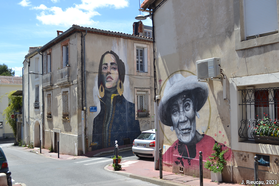Façade rue de Lorraine, représentant un visage de jeune femme, 2018. Arkane